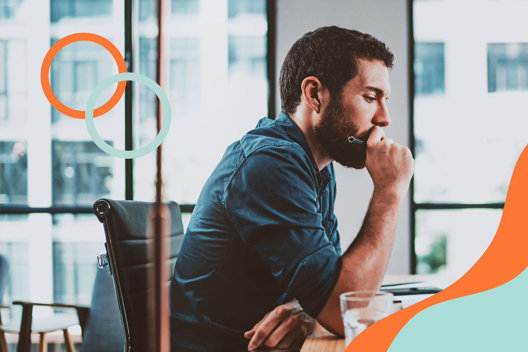 Thoughtful man sitting at his desk
