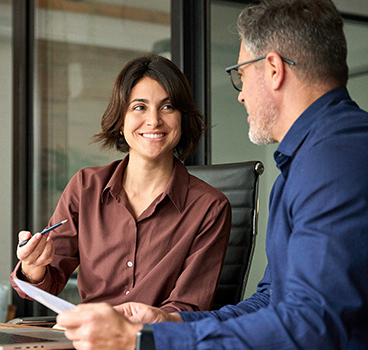 Coaching professional working with a client